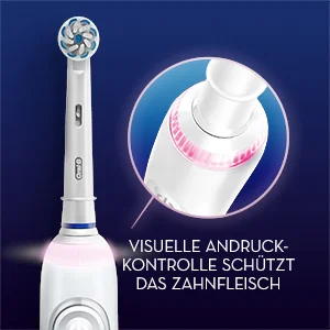 Oral-B Zahnbürste mit visueller Andruckkontrolle, die das Zahnfleisch schützt, hervorgehoben durch eine Nahaufnahme des leuchtenden Rings.
