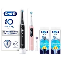 Oral-B iO Series 6 Duo Zahnbürsten mit KI, schwarz & pink, plus 2 Aufsteckbürsten-Sets.